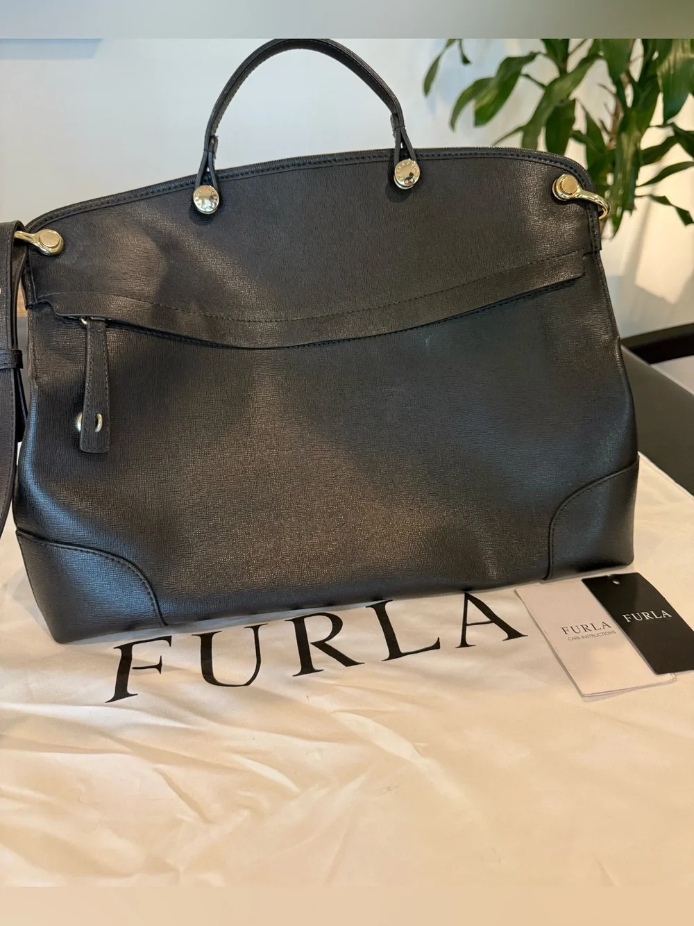 Furla downsizing figured